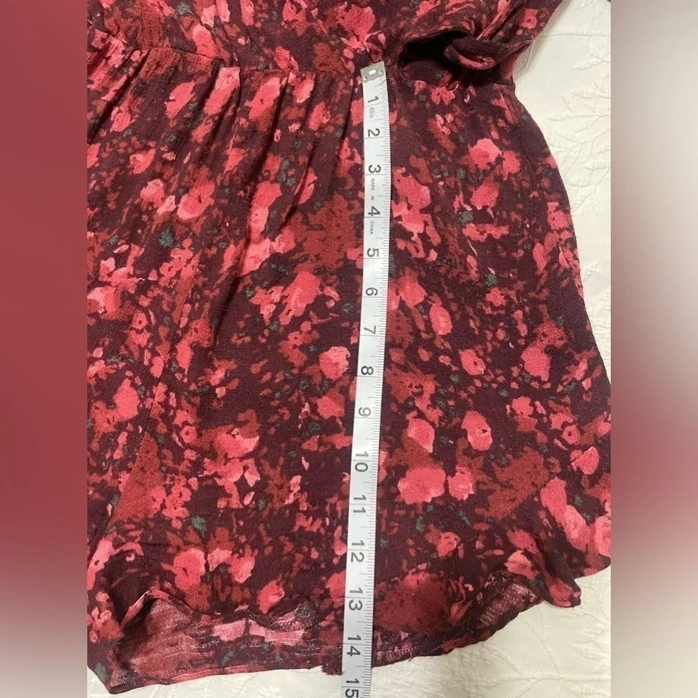 Free People All The Right Ruffles in Wild Moon Floral Romper Size XS OB397455.